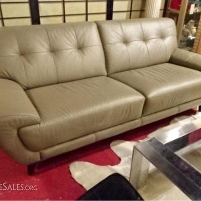 MODERN DESIGN TAUPE LEATHER SOFA, TUFTED BACK, CURVED ARMS, DARK FINISH WOOD LEGS, VERY GOOD CONDITION WITH NO RIPS OR STAINS, 83