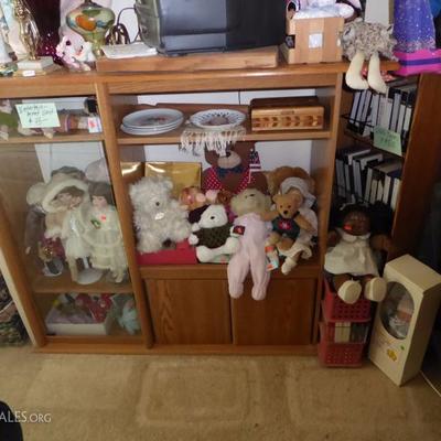 Many dolls and stuffed animals