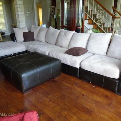 leather/material large sectional with 2 ottomans (one lifts open)