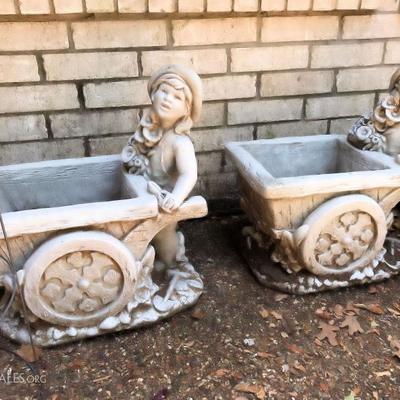 Two matching cement planters