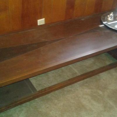 this really is a beautiful coffee table that has a matching end table. this will polish up nicely!
