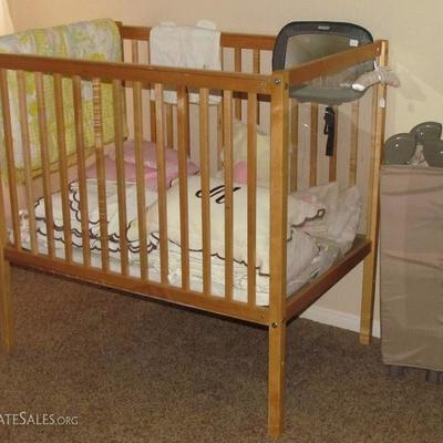 Wooden Window Fixed Sides Port-a-Crib. Also shown, Evenflo Pack'n Play 