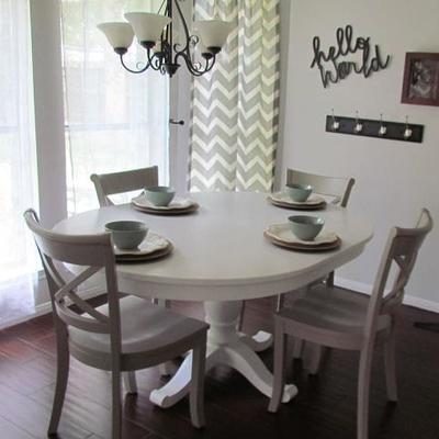 Breakfast Room shown with Crate and Barrel White Paint Oak Pedestal Table and 4 Gray Paint Side Chairs