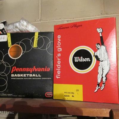 Vintage basketball and baseball mitt