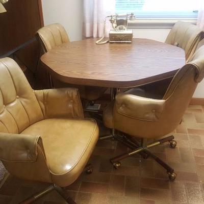 Vintage Kitchen Table with Rolling Chairs