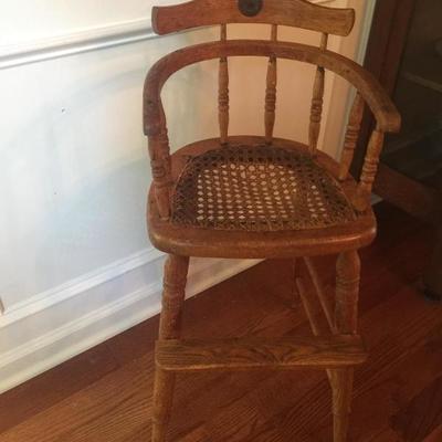 This chair is waiting on a little one - no phone book needed!