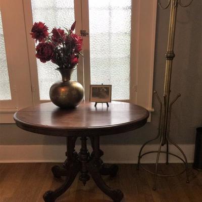 Beautiful Victorian pedestal table and lots of brass from world travels.