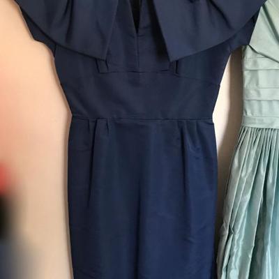 Sorry, the family has removed vintage dresses from the sale. Lovely vintage dress