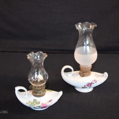 2 Vintage Aladdin's Lantern Oil Lamps: these beautiful oil lamps are decorated with pink roses and gilded with gold.  One lamp is...
