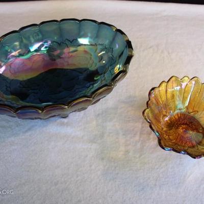 Carnival Glass: iridescent gold-toned small serving bowl (7.25" in diameter 2.75" high) with scalloped edges and a stylized...