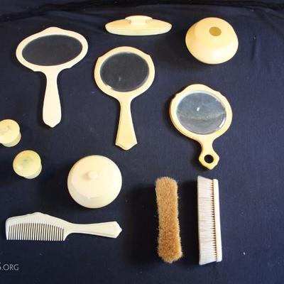 Vintage French Ivory Vanity Set:  (1920-30's) (also referred to as  pyralin or celluloid. 11 item consisting of: 3 hand mirrors, 2 small...