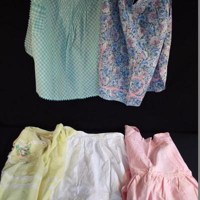 Pastel Vintage Handmade Apron Lot II:  5 aprons all in good vintage condition; floral blue-swirl trimmed with pin and blue rick-rack / no...