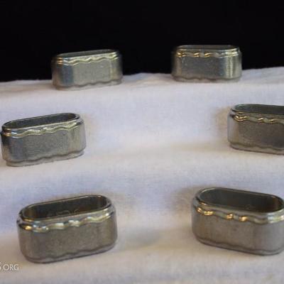Six Armetale-like Napkin Rings by Pacific: 6 matching oval napkin rings marked Six matching 3.5' napkin rings marked with logos and...