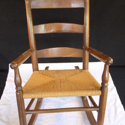 Child's Wooden Rocking Chair with Rush Seat: 22 inches tall, 13 1/2 inches wide. Both Wood and rush sheet are in very good condition and...