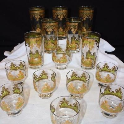 14 Signed Georges Briard Bar Glasses: 7 - 12 oz. highball 22k gold & green, 8- 6 oz. Martini glasses one with  small chip on rim...
