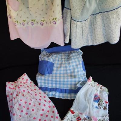 Pastel Vintage Handmade Aprons:  All in good vintage condition 2; 1 child's apron with 2 side pockets made with white organdy and floral...