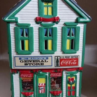 Lighted General Store and house.