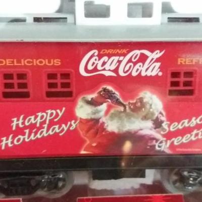 New in box Coca Cola Santa Steam Set, remote control steam engine with accessories.