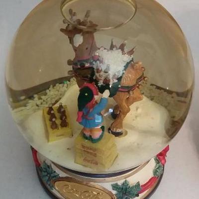 Lot of three (3) snow globes - elf and reindeer, three (3) carolers, polar bear snow man and two (2)