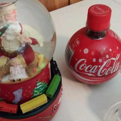 Santa snow globe with train rotating and music box, round Coke bottle with snow flakes, glass Santa 