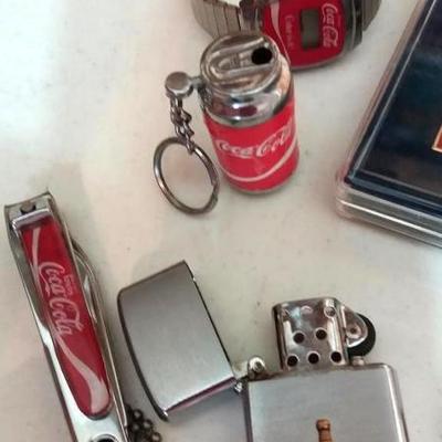 Mixed lot of Coca-Cola Cross pen, Barlow Coca-Cola lighter, miniature Coca-Colas, Coca-Cola can knif