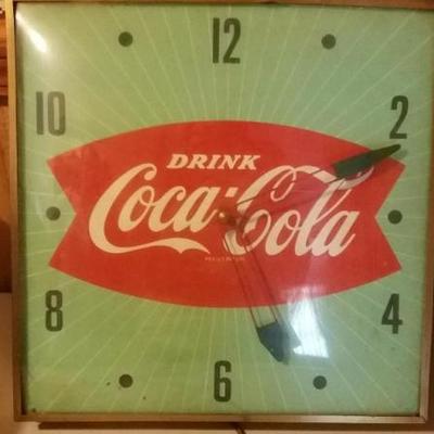 Vintage Drink Coca-Cola electric clock in bushed gold antique metal.