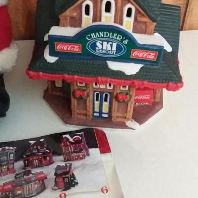 One (1) Town Square Collection of Chandler's Ski Lodge (lighted) and one (1) Rich's vintage Santa ho