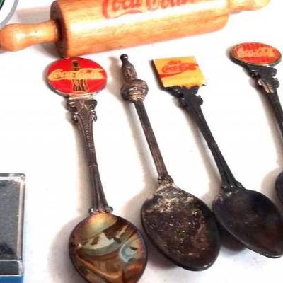 Six (6) Coca-Cola thimbles, Four (4) Coca-Cola collectible spoons, salt and pepper shakers, miniatur
