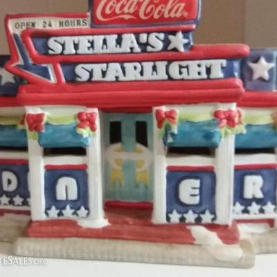 Train Depot (lighted) and Stella's Starlight Diner (lighted).