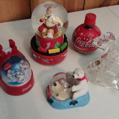 Santa snow globe with train rotating and music box, round Coke bottle with snow flakes, glass Santa 