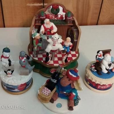 Santa serving at the Soda Fountain (music box), polar bear with penguin, polar bear with a seal, moo