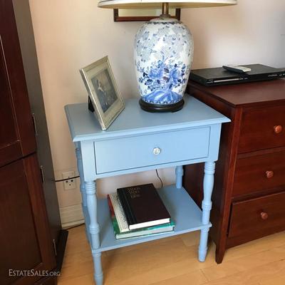There's a pair of these blue painted knight stands/end tables