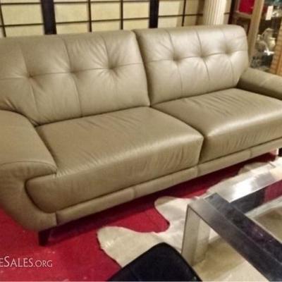 $294.00 - MODERN DESIGN TAUPE LEATHER SOFA, TUFTED BACK, CURVED ARMS, DARK FINISH WOOD LEGS, VERY GOOD CONDITION WITH NO RIPS OR STAINS,...