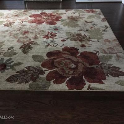 This rug is big....like 9x12.  and beautiful.  It's great that it's floral. Such a happy pattern.