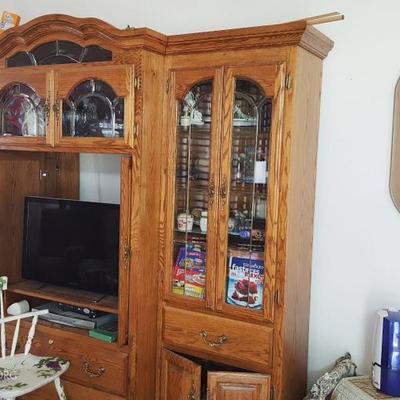 large entertainment center and flat TV 