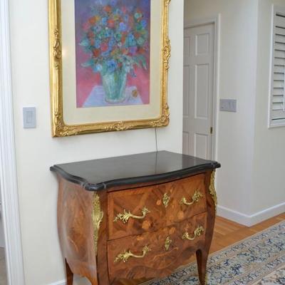 Marble top bombe chest and artwork by Kahlil Gibran
