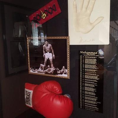 Mohammad Ali singed boxing glove and hand-print 