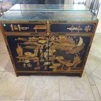 CHINESE BLACK ENAMEL CABINET, GOLD PAINTED LANDSCAPES, BRASS PULLS, 2 DRAWERS ABOVE 2 DOOR CABINET