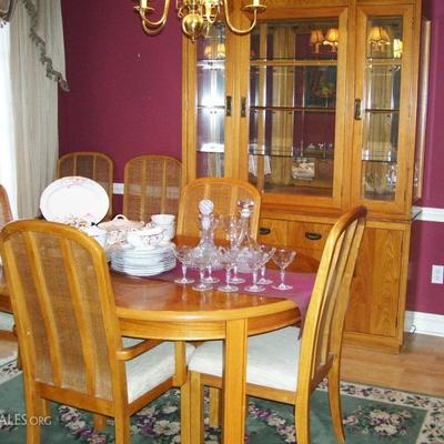 Dining room table with table pads - lighted china cabinet