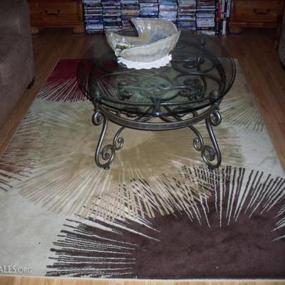 Area rug - 5' x 7' , Glass top Coffee table with metal base