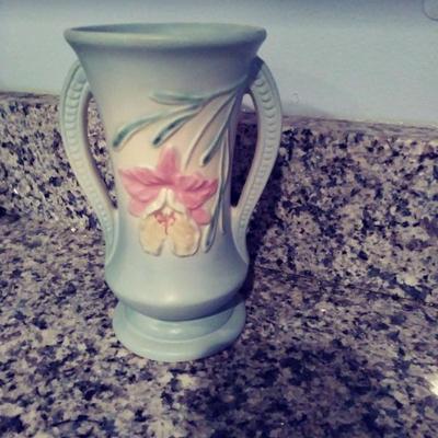 Not a reproduction! This vintage gem of a relief floral Hull vase is about 8 in tall, and rare to find one kept in such perfect condition