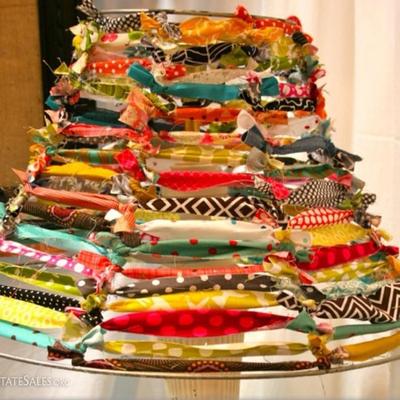 A fun way to repair an old lamp frame with tied fabric "rag rug" look! We can come up with ways to repurpose something old or...