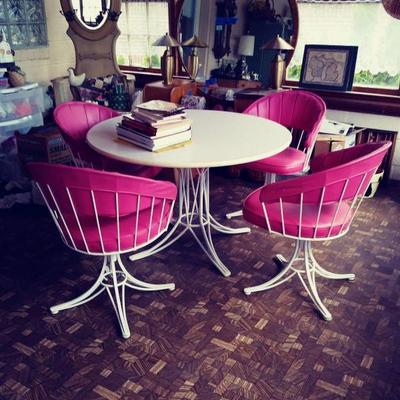 Mid-century table w/ four pink swivel chairs $125

SOLD ON MONDAY! :) 
Sorry to go :(