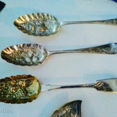 vintage sterling spoons w/ embossed scenes or fruits