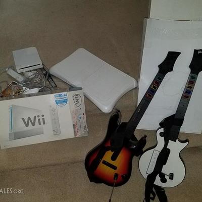 Wii set with 2 guitar's and Fit board $99