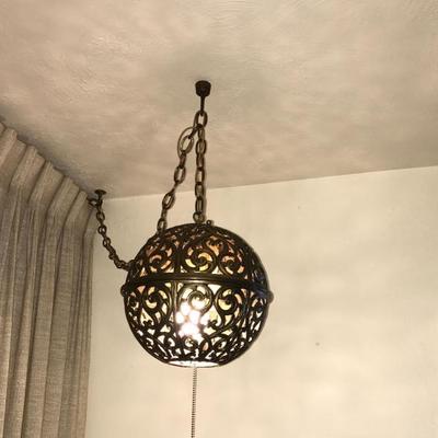 Mid-Century Karakusa Swag Lamp. Japanese Pierced Brass throws light patterns on ceiling and walls.
