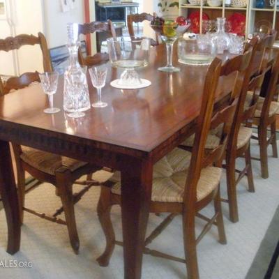 beautiful dining table and eight chairs