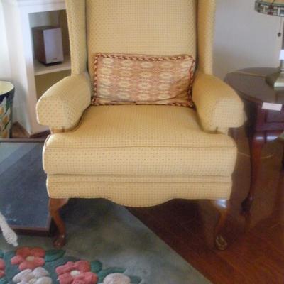 one of pair of upholstered wing chairs