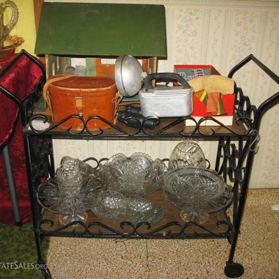 iron tea cart, vintage glassware, home made doll house and furniture