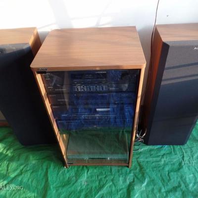 Sony HST-231 5 cd, dual cassette, radio, equalizer 200 watt? stereo system in glass cabinet with 2 speakers and option to record player